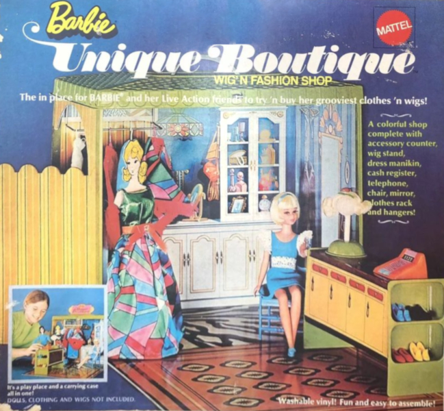 Box for the Unique Boutique play set is printed with a full color photo of the boutique: a rectangular one-room shop enclosed on two sides, with a green roof and interior or walls of blue lithographed with a Tiffany pendant lamp, full-length "mirror, white shelves covered with accessories, zebra-striped floor covering. A dressing room extends from a third wall but can't be seen into from this angle. Next to the drawing room a metal bar extends from the wall, holding clothing on hangers. On the fourth side the wall has folded down to form a carpeted floor. on which sits a blue plastic chair (with Hair Happenins Feancie seated) and a counter with cash register, wigstand, and embedded shelves holding four pairs of shoes. A cardboard mannequin with yellow flip hair wears Rainbow Wraps. Text reads Mattel Barbie Unique Boutique Wig 'n Fashion Shop. The in place for BARBIE and her Live Action friends to try 'n buy her grooviest clothes 'n wigs! A colorful shop complete with accessory counter, wig stand, dress manikin, cash register, telephone, chair, mirror, clothes rack and hangers! It's a play place and a carrying case all in one! Washable vinyl! Fun and easy to assemble! DOLLS, CLOTHING AND WIGS NOT INCLUDED.