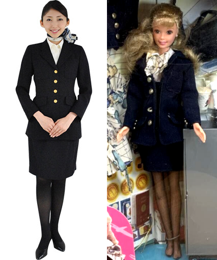 Human and doll wear navy suit of blazer with 4 brass-type buttons and navy skirt to the knee (human) or some distance above (doll). Both wear a white blouse, print scarf tied at the neck, and dark hose. Human wears black closed-toed shoes while doll wears none. Doll is shown boxed with some of her ephemera around her. The shoes are probably in there somewhere. Visible are a metal-look serving cart and service items, a garment (possible blouse) in the print from the scarf, an addition navy item with brass buttons, and a black shoulder bag.